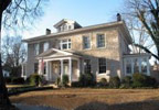This 1915 Georgian Revival home is located in the heart of one of Florence's many historical districts and is listed on the National Register of Historic Places. 