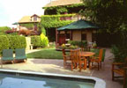 Yountville, California (CA) Bed and Breakfast: Three lovely buildings situated on an acre of beautifully landscaped gardens comprise the Maison Fleurie, our sanctuary for guests traveling to the luscious Napa Valley.  Finely crafted furniture, rich fabrics, and a huge stone fireplace lend their ambiance to the historic main building, where a bountiful breakfast and afternoon wine and hors d'oeuvres are served. Thirteen enchanting guest rooms, a pool and spa are spread throughout the inn's grounds.  The gracious lifestyle of the Napa Valley will leave you warmed and refreshed when you return home.