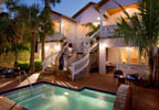 Melbourne Beach, Florida (FL) Bed & Breakfast: All our luxurious rooms have central air conditioning, telephone, cable television, high speed internet access, irons, hair dryer, makeup mirror, bathrobes and security safe. Besides soaking in our waterfall spa pool, and lounging on your private porch, all of our guests can enjoy hi-speed internet anywhere on the property. Each morning home-baked breads, fresh fruits and delicious breakfasts are served in our beautifully restored dining room.