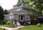 Westside, Iowa Bed and Breakfast: Our floor plan is open to all guests.  Eat bistro-style in our wrap-around 4 seasons porch.  See the trains all day long as sip on gourmet coffees and cappucinos!  The downstairs also has a dining room, spare bedroom for the kids, and the kitchen where Deb reigns.  We offer 3 guest rooms. Hunters welcome.
