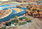 Rigby, Idaho (ID) Bed & Breakfast: Retreat, relax, unwind, and indulge at our new western-style lodge located on the South Fork of the Snake River. Seven rooms, each with private bath, river views and amenities such as jetted tubs, fireplaces, robes, and private balconies. A full breakfast includes home-made pastries, omelets and quiche.