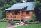 Colfax, Indiana Bed and Breakfast:  At Cabins & Candlelight, you'll find a romantic log cabin getaway unlike any other in central and west-central Indiana. Even though we're just 35 minutes northwest of I-465 in Indianapolis, you'll easily leave behind the hectic pace, pressures and distractions of everyday life.  Pamper yourself in a luxury cabin complete with a 15-foot stone fireplace with gas-burning logs, an oversized whirlpool bathtub, TV/VCR/DVD entertainment center, a queen-size bed and a full kitchen.