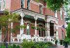 Vevay, IN Bed & Breakfast: The Rosemont Inn is a beautifully restored 1881 brick mansion filled with lovely native hardwood woodwork and period Eastlake antique furniture.   The wicker furniture filled front porch is a great place to spend an afternoon, just watching the river flow by.