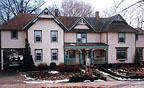 Twin Oaks Inn in Saugatuck, Michigan was at the turn of the century a lumbermen's boarding house, is now an elegant and charming Olde English Bed and Breakfast.