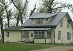 Starbuck, Minnesota (MN) Bed & Breakfast:  Rooms have a Queen bed, two nightstands, a closet with shelves or an armoire. Three bedrooms upstairs share a bathroom with a shower and a spacious parlor. The upstairs parlor provides comfortable sitting for watching the satelite TV, your DVDs, or reading. There is DSL internet available at the computer desk. A printer is available if needed. Downstairs is a bedroom with private half bath reserved for the mobility impaired.  An ADA equipped shower is available. The concrete ramp makes access to the house easy.