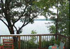 Battle Lake Minnesota bed and breakfast where summer breezes whisper through old maples and the setting sun casts a magical glow.