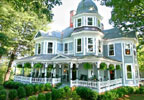 Asheville, North Carolina Bed & Breakfast: A County Landmark, this Queen Anne Victorian B&B is listed on the National Register of Historic Places and is filled with antique furnishings and gorgeous paintings. There are four beautifully appointed guest rooms available with luxurious linens, antiques, fireplaces, and private baths with whirlpool tubs. A cozy suite is also available in a separate cottage that was built around the turn of the century and was used as the original servant's quarters. A full breakfast is included, as well as afternoon tea served either on the porches or by the fireplace in the parlor.