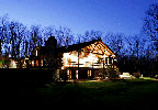 Canandaigua, New York (NY) Bed & Breakfast: Enjoy your stay in one of our three bedroom suites which are elegantly decorated with warm colors and beautified with Pottery Barn bedding to compliment the rustic log cabin rooms. Each room is temperature controlled including air conditioning in the summer and fireplaces in the winter. All suites have private baths with full walk in showers, soaking tubs, king sized beds. Avail yourself of a multitude of amenities including individual serving coffee/tea maker, refrigerator, microwave, and cable TV with DVD and CD players, wireless internet and much more.