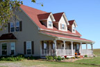 Agra, Oklahoma (OK) Bed & Breakfast: The Playroom, graced by childhood memories of yesteryear, is decorated in warm, fall colors with a full-size poster bed boasting a pillow top mattress and comfy bed linens. From the privacy of your room, you will have a beautiful view of the open countryside. For business travelers, there will be a desk with DSL internet connection. This room includes its own private bathroom with a claw foot tub/shower.