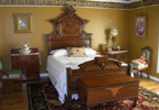Jenks, Oklahoma (OK) Bed & Breakfast: Our guest rooms offer a rich and elegant Victorian escape. All guest rooms are uniquely furnished and decorated with authentic Victorian antiques and decor with accommodating ceiling fan, closet, alarm clock, and central heat/air conditioning. A private bath is located in the hallway. Enjoy a delicious breakfast each morning.