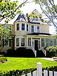 Seaside, Oregon (OR) Bed & Breakfast: The inn features 10 guestrooms, all with private baths, queen-size beds, color television, private parking, in-room telephones and a full breakfast. Our breakfast room seats 16 comfortably and the morning sun floods the room. The house features the 1892 natural fir tongue and groove ceilings and walls on the first two floors. The parlor features a large fireplace and is filled with flowery country French furniture and antiques. The Gilbert Inn is one block from the ocean and one block to Broadway.