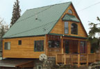 Portland, Oregon (OR) Bed & Breakfast: Enjoy the entire private downstairs Bungalow that comfortably sleeps 5, with queen bed, full specialty futon bed, twin bed. Color TV with cable connection, DVD and VHS player, private phone with computer for quick internet access, hot-tub with enclosed garden covered patio, private entrance and parking, two desks, table and chairs, walk in closet, large bathroom, small fridge-freezer, coffee/tea maker, microwave, double hot plates, toaster oven, toaster, laundry service available upon request.