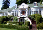 Portland, Oregon (OR) Bed & Breakfast: This '40s-era, Georgian colonial home sits on peaceful grounds that have been meticulously landscaped into terraced gardens and sweeping lawns. On mornings when the weather is fine, breakfast is served on the back patio in the shade of a giant maple tree. Portland's West Hills offer a lofty view of the city from a serene treed setting, and this quiet hideaway is located just minutes away from downtown.
