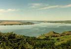 WELCOME....to our contemporary home built on a bluff overlooking a scenic bend on the Missouri River and the Prairie Hills of South Dakota.