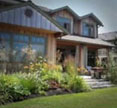 Sammamish, Washington (WA) Bed and Breakfast: Escape to a deluxe lakeside cottage. Relax. Observe bald eagles, otters and deer. Explore the shoreline, or just study the clouds.  If you have work to do, take your laptop outside and use our wireless internet network in the gardens or on the dock.